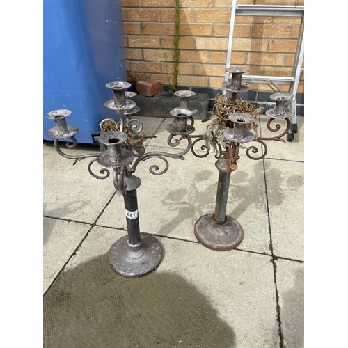 681 - 2 Metal candelabras