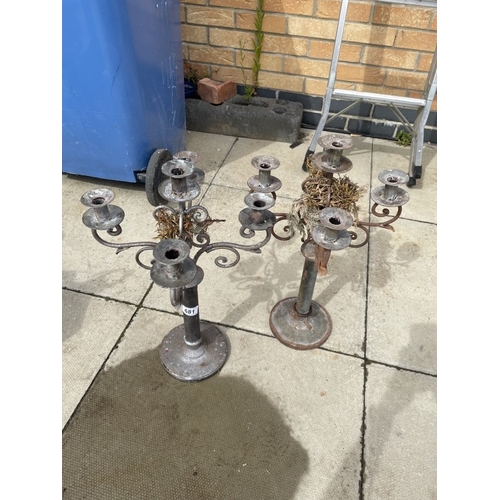 681 - 2 Metal candelabras