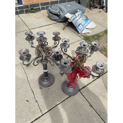 687 - 2 Metal candelabras