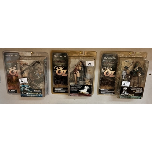 21 - 3 Twisted Land Of Oz figures in blister packs. Dorothy, Wizard & Flying monkey All as new.