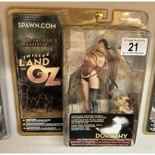 21 - 3 Twisted Land Of Oz figures in blister packs. Dorothy, Wizard & Flying monkey All as new.