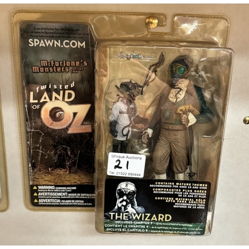 21 - 3 Twisted Land Of Oz figures in blister packs. Dorothy, Wizard & Flying monkey All as new.