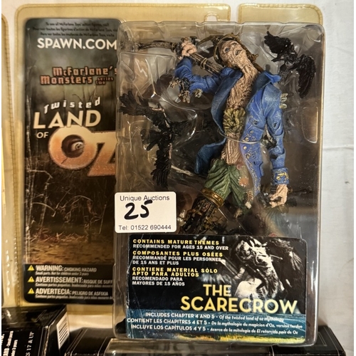 25 - 2 McFarlane monsters from Twisted Land Of Oz Scarecrow & Tin Woodman in blister packs. As new,  A bo... 