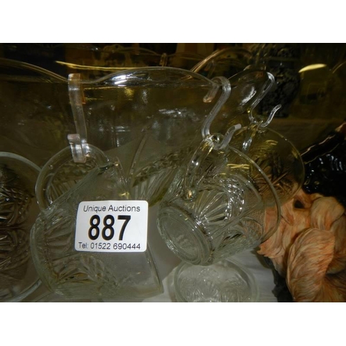 887 - A large glass punch bowl with cups and a plastic ladle. COLLECT ONLY.