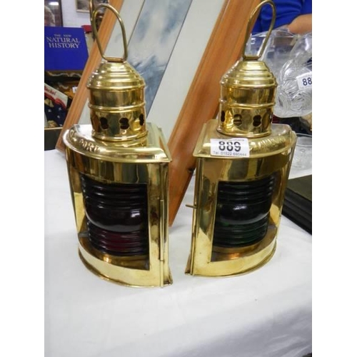 889 - A pair of modern brass ships lamps.