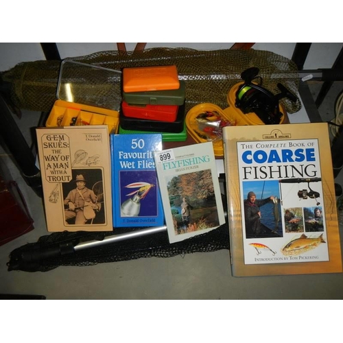 899 - A mixed lot of fishing sundries and books.