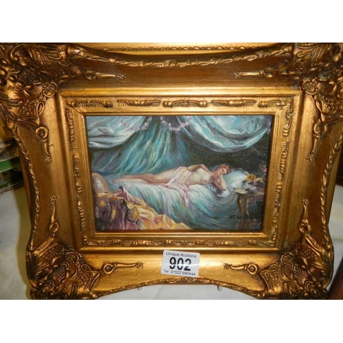 902 - A gilt framed over painted print nude study.