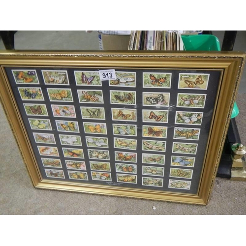 913 - A framed and glazed set of butterfly cards. COLLECT ONLY.