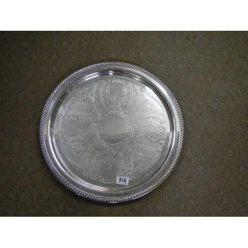 914 - A large circular silver plate tray.