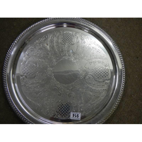 914 - A large circular silver plate tray.