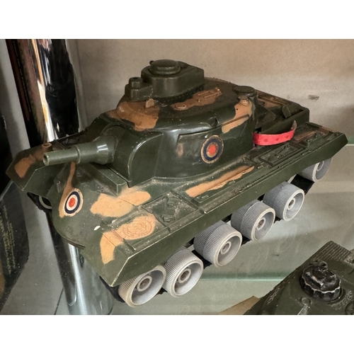 28 - A Marx Battery Up tank, one other, A Dinky Leopard tank & Britains scout car