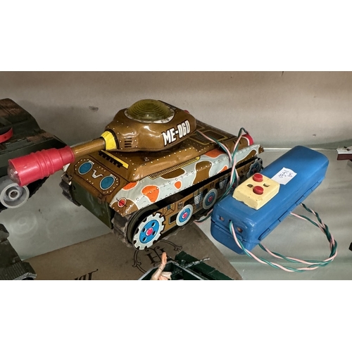 28 - A Marx Battery Up tank, one other, A Dinky Leopard tank & Britains scout car