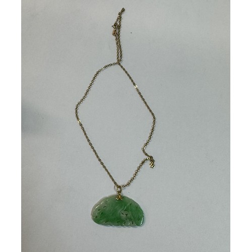 1019 - A 9ct gold chain with jade/jadeite pendant - total weight 6.8gms, approximate weight of gold 2gms, s... 