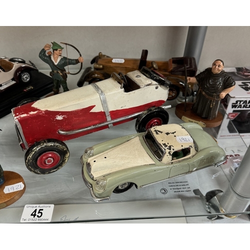 45 - A mixed lot of tinplate, diecast etc including Burago, Wooden tourer, Robin Hood figures etc