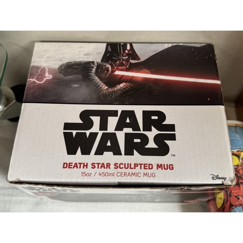 47 - A collection of new Star Wars items including figures, mugs in a box, backpacks & Avengers items