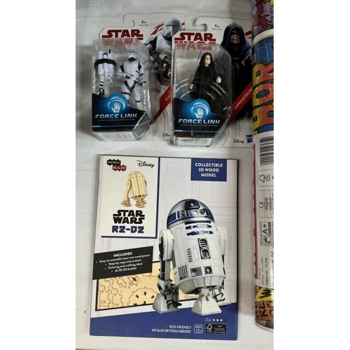 47 - A collection of new Star Wars items including figures, mugs in a box, backpacks & Avengers items