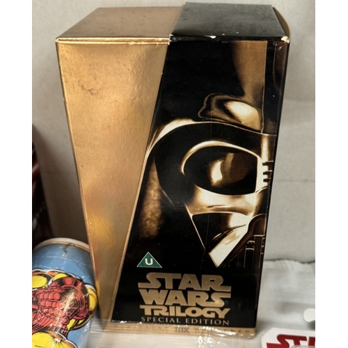 47 - A collection of new Star Wars items including figures, mugs in a box, backpacks & Avengers items