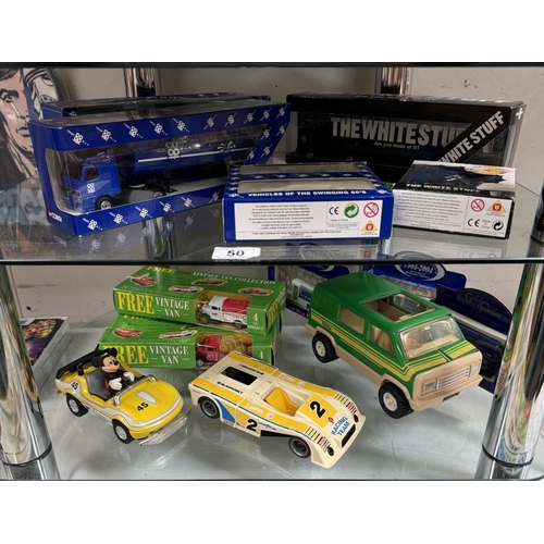 50 - A selection of boxed Corgi & Lledo Co-Op & Milk themed diecast vehicles.