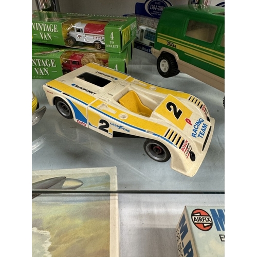 50 - A selection of boxed Corgi & Lledo Co-Op & Milk themed diecast vehicles.