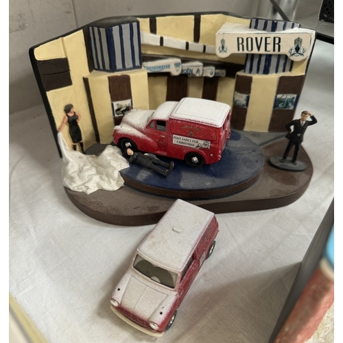 53 - 3 Model car dioramas including Rover garage