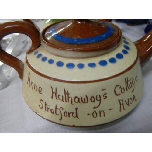 929 - Five good Torquay motto ware souvenir teapots.