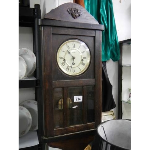 934 - An oak Acctim wall clock in working order, COLLECT ONLY.