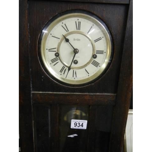 934 - An oak Acctim wall clock in working order, COLLECT ONLY.