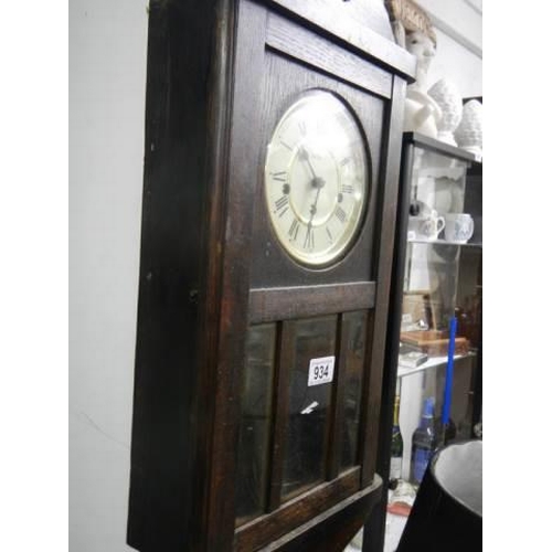 934 - An oak Acctim wall clock in working order, COLLECT ONLY.