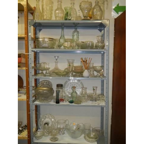 943 - Five shelves of assorted glass vases, bowls, dishes etc., COLLECT ONLY.