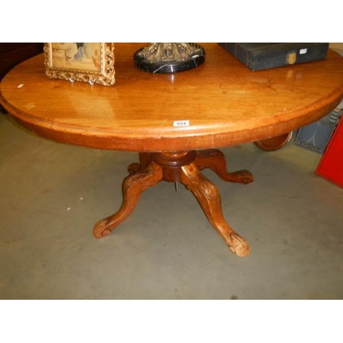 954 - An oval mahogany table, COLLECT ONLY.