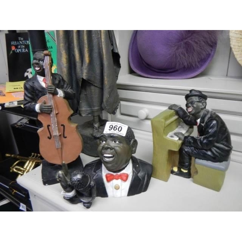 960 - A set of three black musician figures and another figure. COLLECT ONLY.