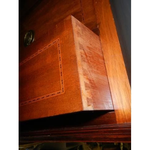 981 - A good mahogany two over three chest of drawers with string inlay. COLLECT ONLY.