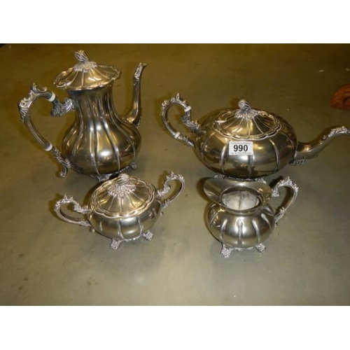 990 - A good quality four piece silver plated tea set.