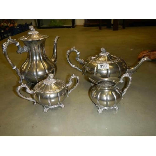 990 - A good quality four piece silver plated tea set.