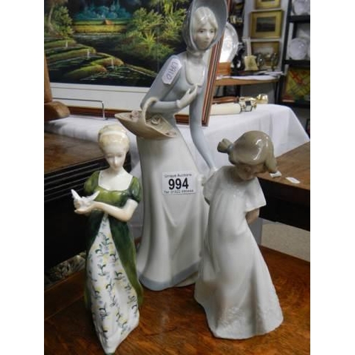 994 - Three figurines including Royal Doulton, NAO etc.,