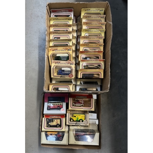 74 - A collection of approximately 54 boxed Yesteryear, Lledo models