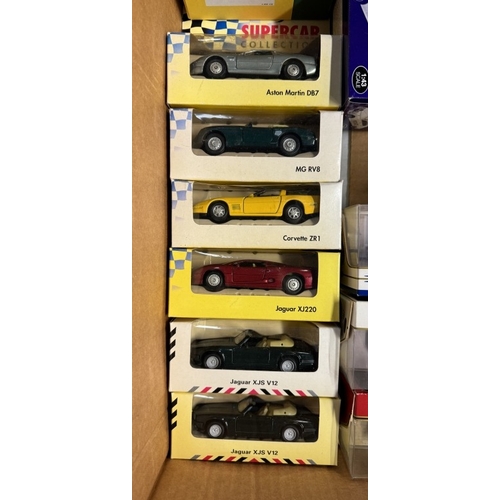 82 - A quantity of boxed mixed brand diecast including Maisto, Supercar collection, Matchbox, Dinky etc, ... 