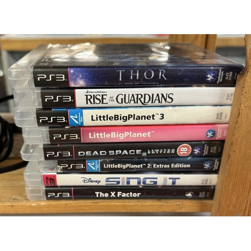 100 - A PS3 console (A/F Missing disc lid) & Some PS3 games