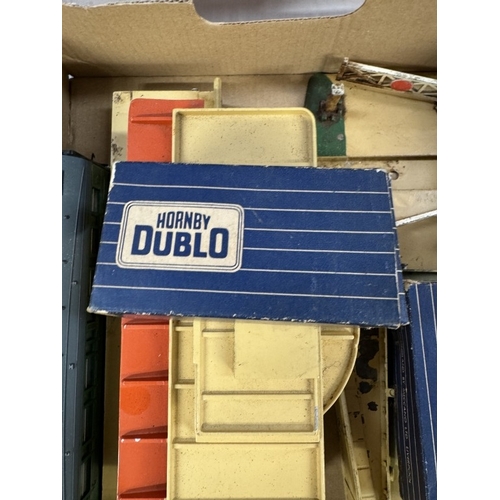 103 - A Hornby Dublo station platform & boxed goods wagons etc