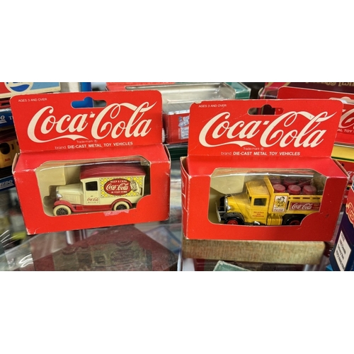 121 - A quantity of boxed Pepsi & Coke diecast including Matchbox, Convoy, Lledo etc