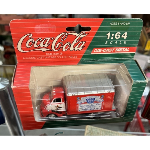 121 - A quantity of boxed Pepsi & Coke diecast including Matchbox, Convoy, Lledo etc