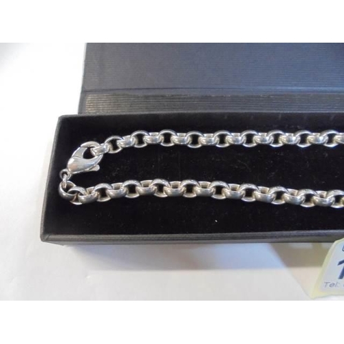 1036 - A heavy silver necklace, 62.4 grams.