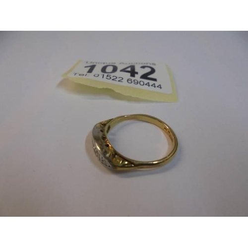 1042 - An 18ct gold & platinum diamond ring (early to mid 20C) approximately 3 grams, size M half.