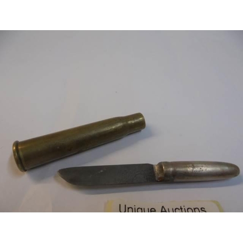 1044 - A WW1 trench art bullet knife.