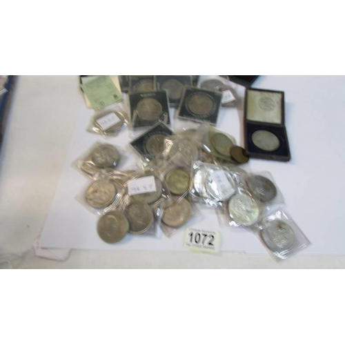 1072 - A collection of coins including crowns, limited editions etc.,