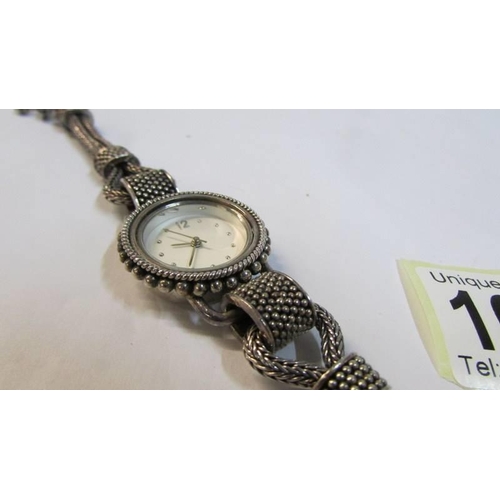 1085 - A lady's silver wrist watch, total weight 48 grams.