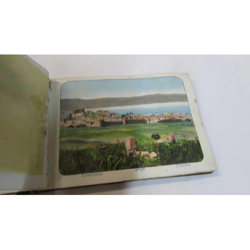 1096 - Eight WW1 silk greeting cards and an olive wood Jerusalem souvenir album.