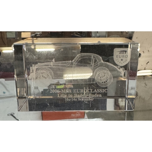 133 - A RAC 1997 Euro classic medallion, Silverstone rally plaque & 3 Heavy etched glass paperweights of A... 