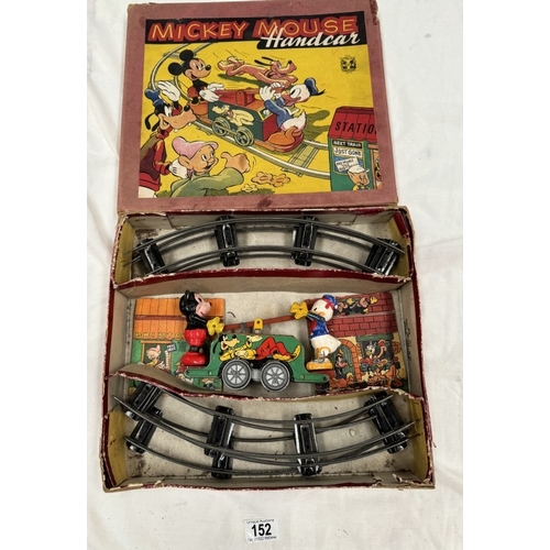 152 - A Rare boxed Wells London Mickey Mouse handcart. In working order. (Donald duck foot A/F)