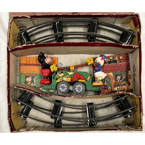 152 - A Rare boxed Wells London Mickey Mouse handcart. In working order. (Donald duck foot A/F)